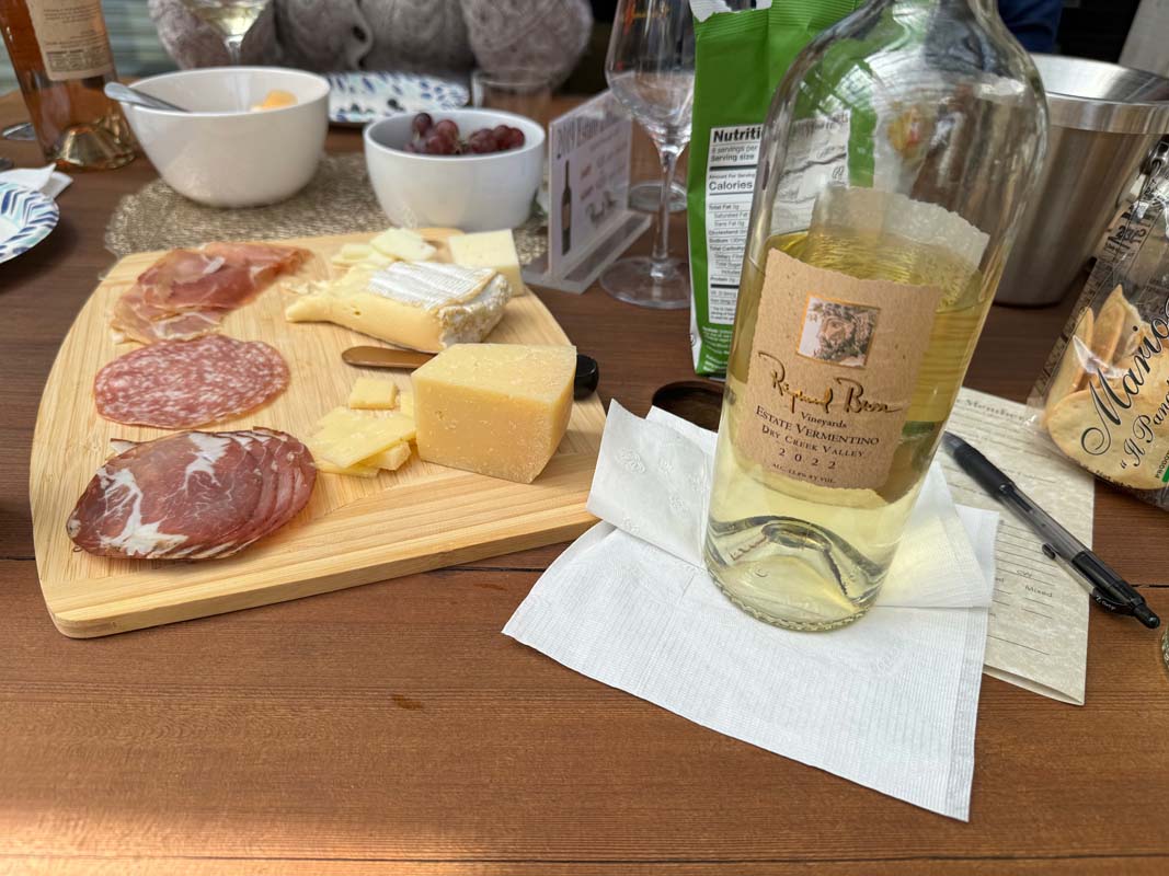 Charcuterie board paired with Raymond Burr Vineyards Estate Vermentino during a wine tasting